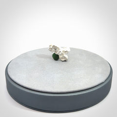 This is a handcrafted New Zealand Pounamu, Jade and sterling silver ring.