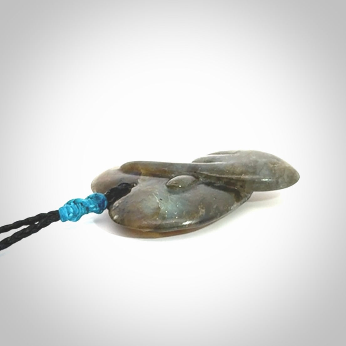 This is a hand carved love heart pendant made from Labradorite stone.