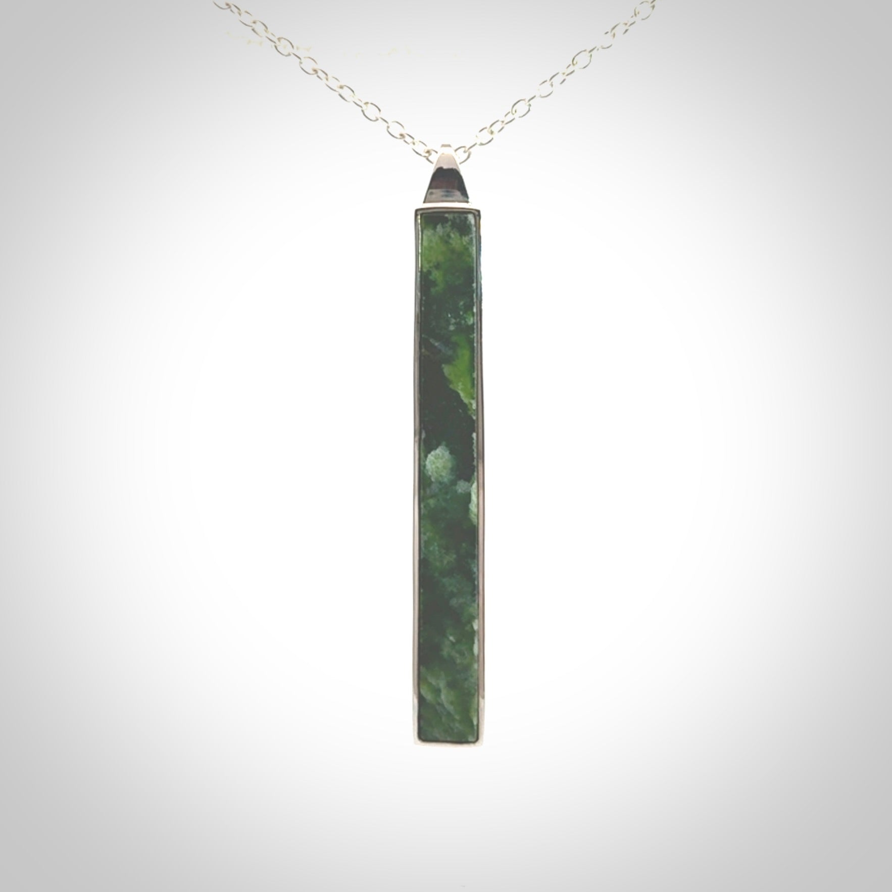 Hand carved New Zealand jade drop pendants with Sterling Silver.