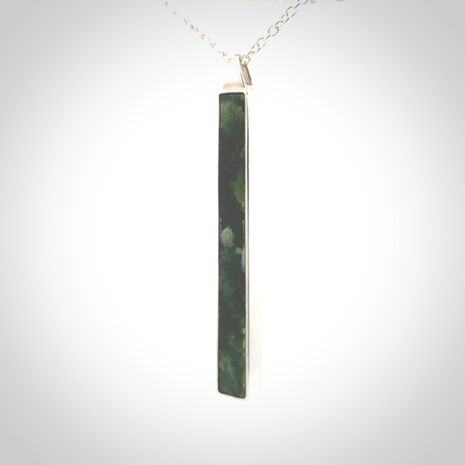 Hand carved New Zealand jade drop pendants with Sterling Silver.