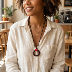 woman wearing red jasper zen circle pendant