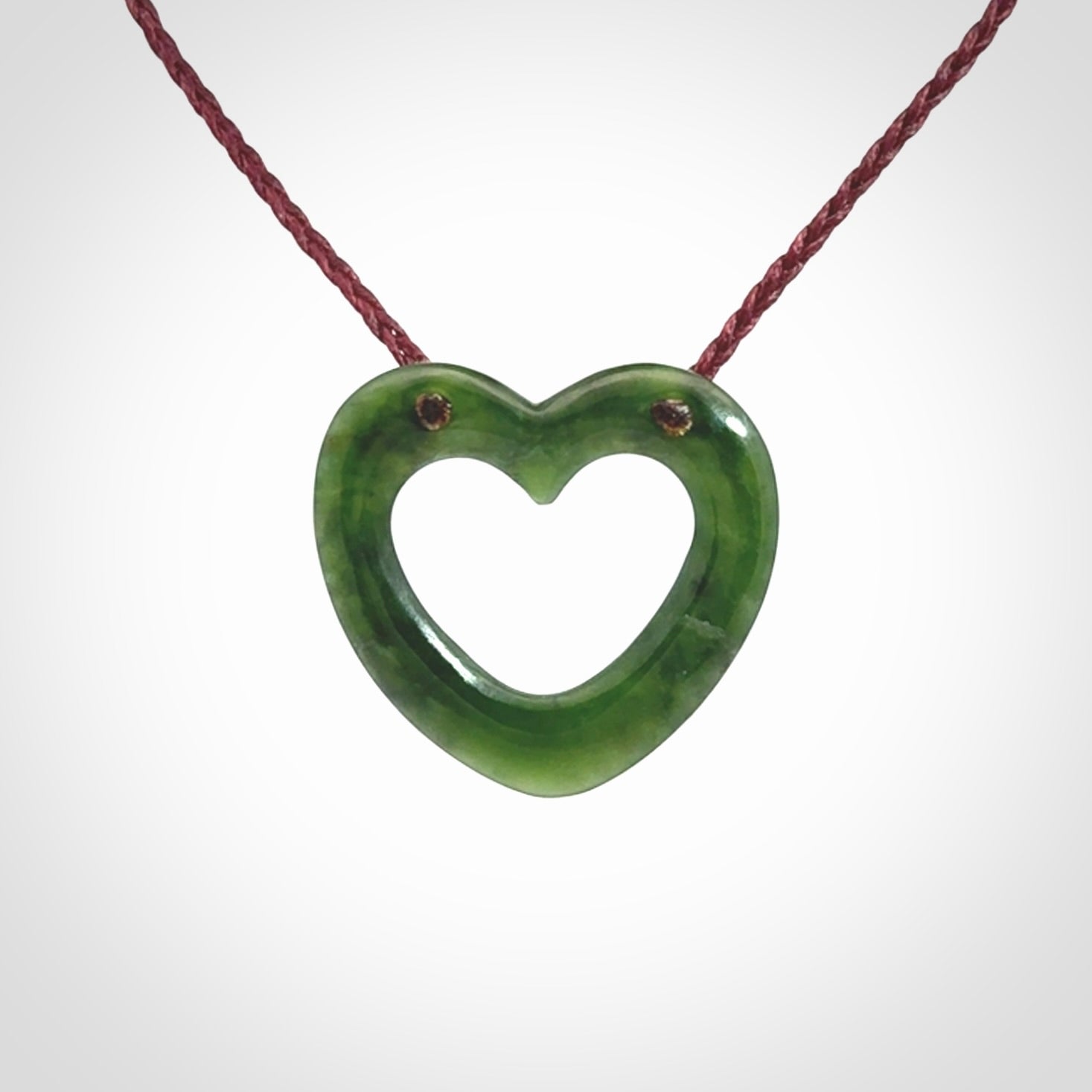 This is a wonderfully fine, hand-carved heart pendant, made from the finest quality New Zealand jade. These are provided with a fine, hand-plaited cord which is adjustable so that you can position the pendant where it suits you best. These are delivered with free shipping worldwide.