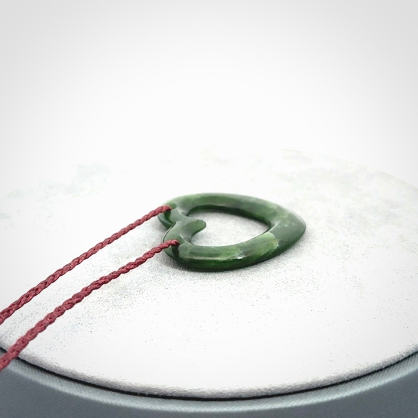 This is a wonderfully fine, hand-carved heart pendant, made from the finest quality New Zealand jade. These are provided with a fine, hand-plaited cord which is adjustable so that you can position the pendant where it suits you best. These are delivered with free shipping worldwide.