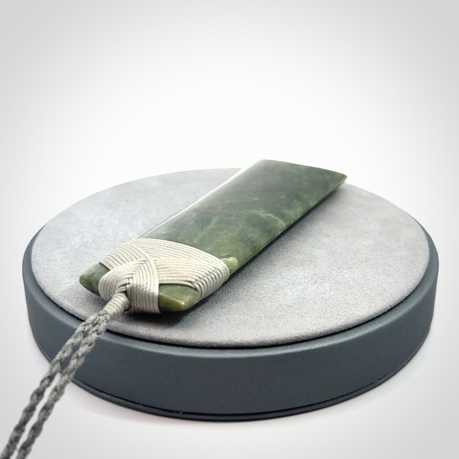 Hand carved large New Zealand Jade toki pendant.
