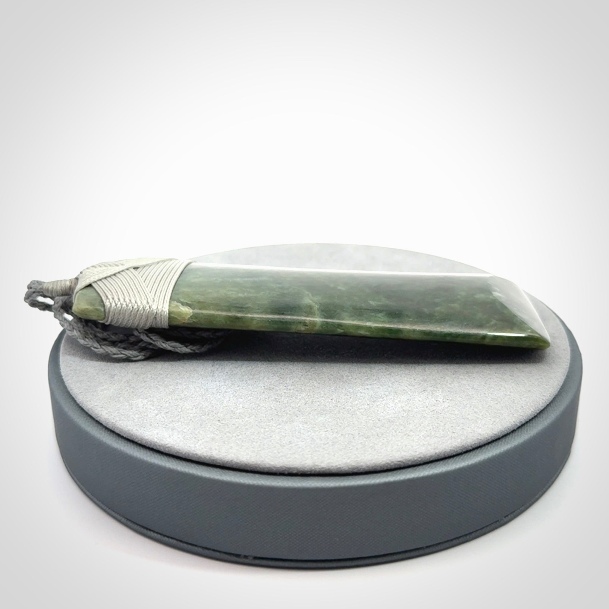 Hand carved large New Zealand Jade toki pendant.
