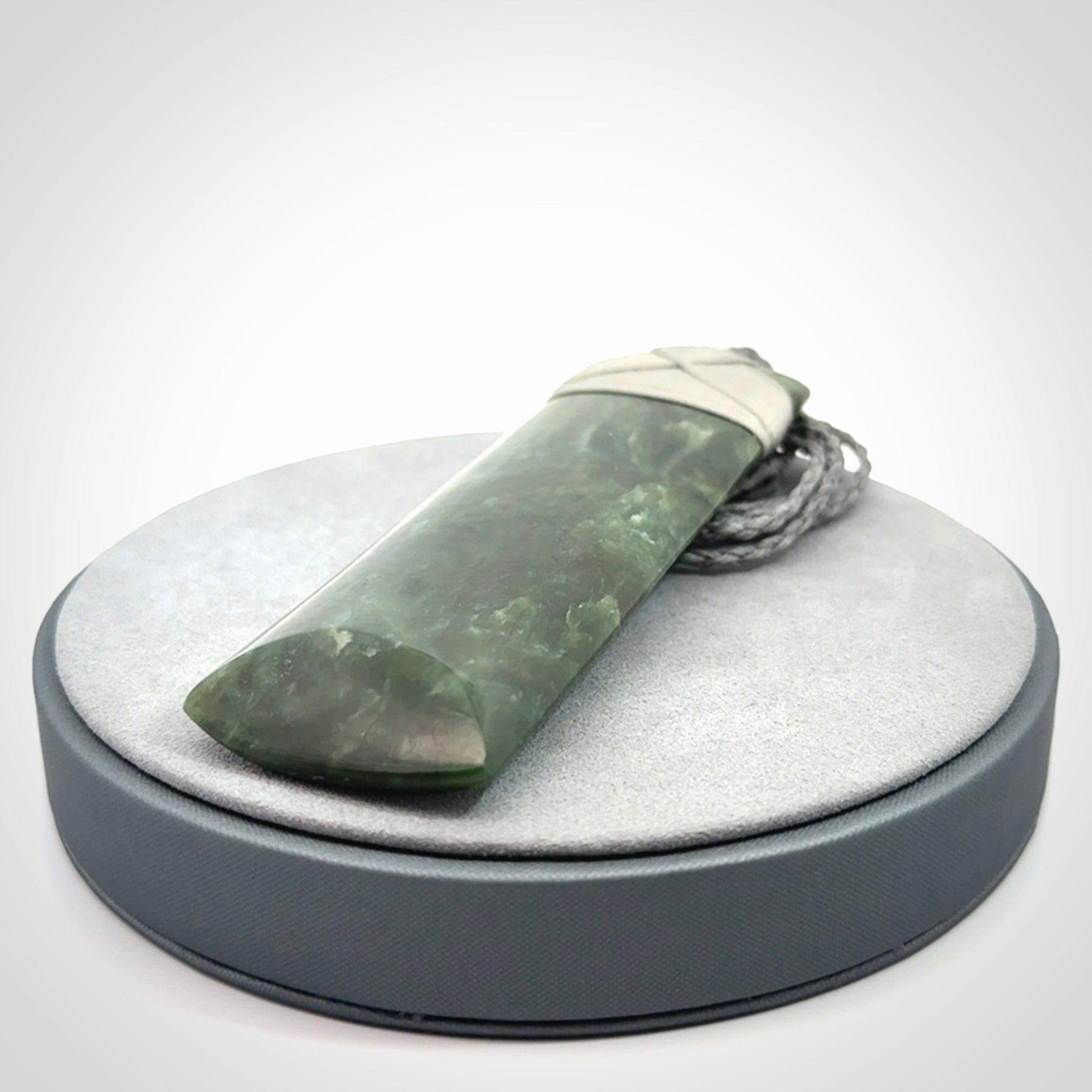 Hand carved large New Zealand Jade toki pendant.