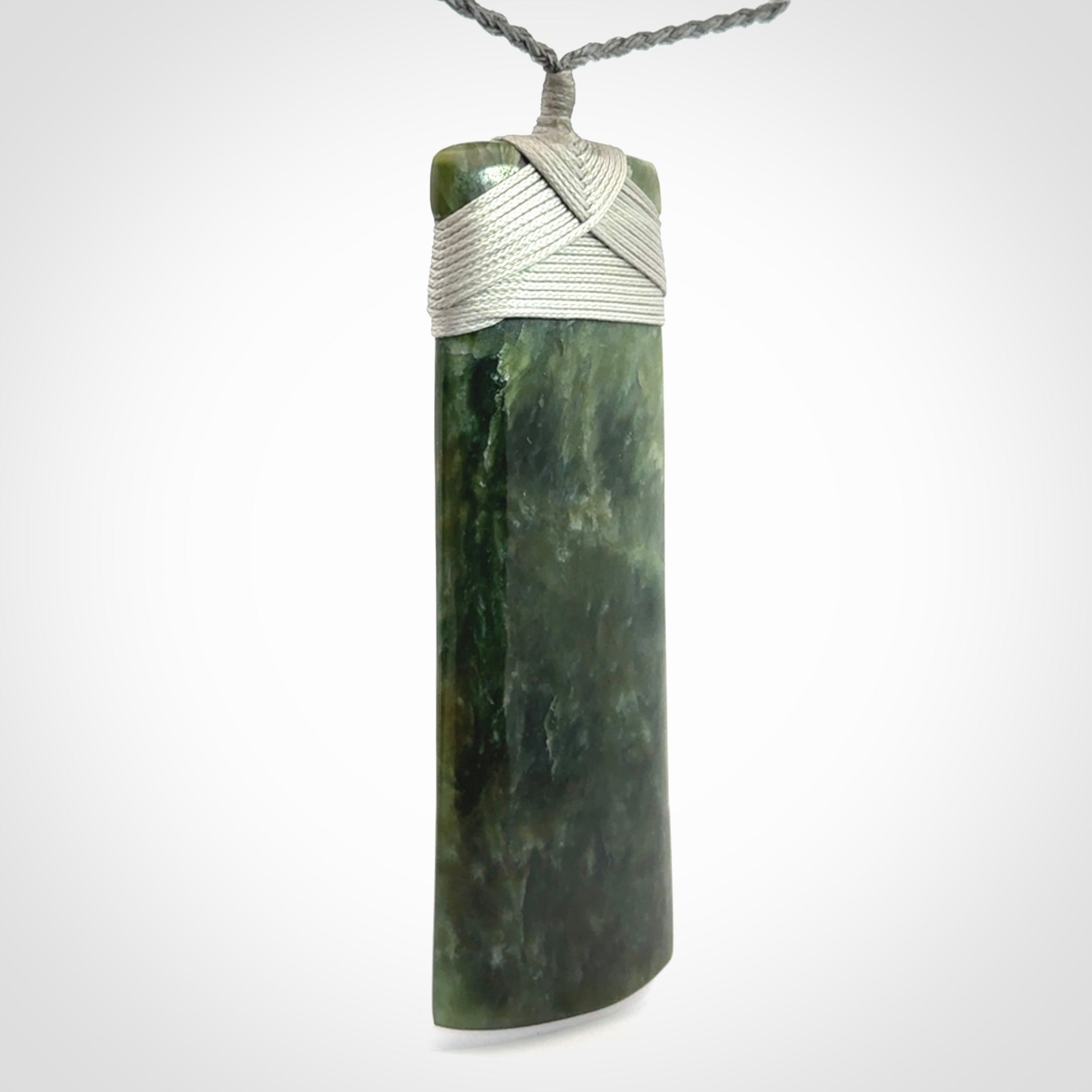 Hand carved large New Zealand Jade toki pendant.