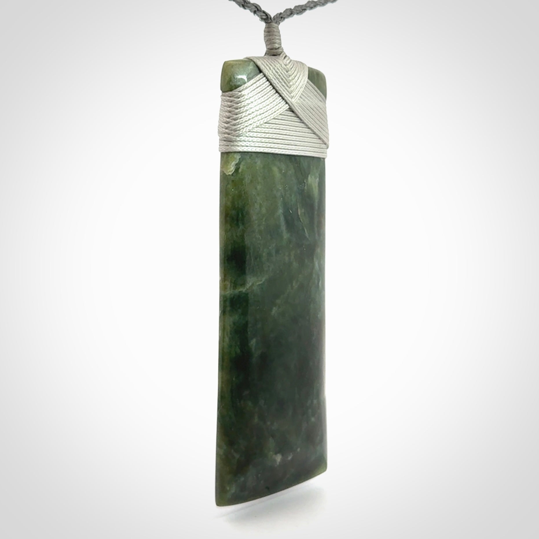 Hand carved large New Zealand Jade toki pendant.