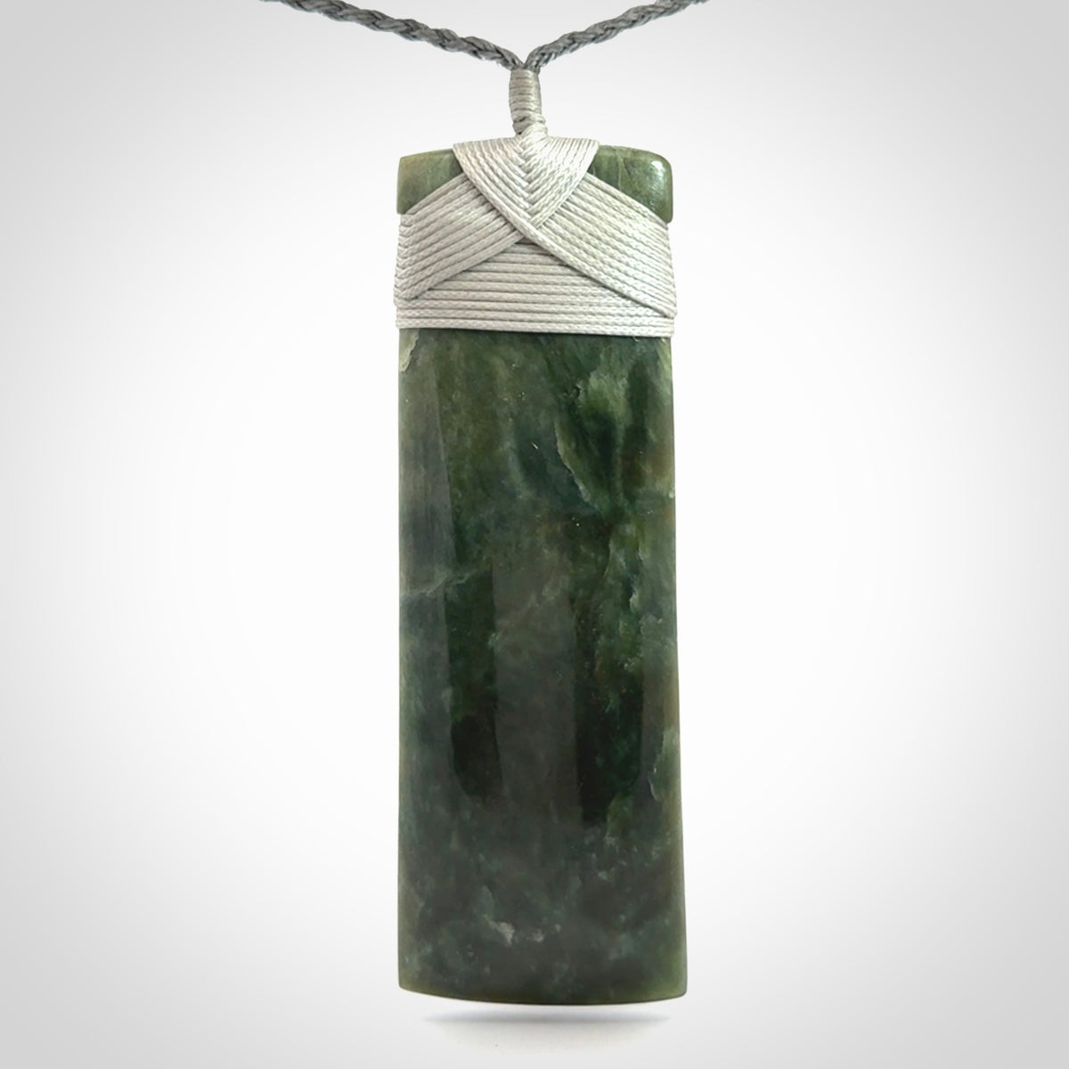 Hand carved large New Zealand Jade toki pendant.