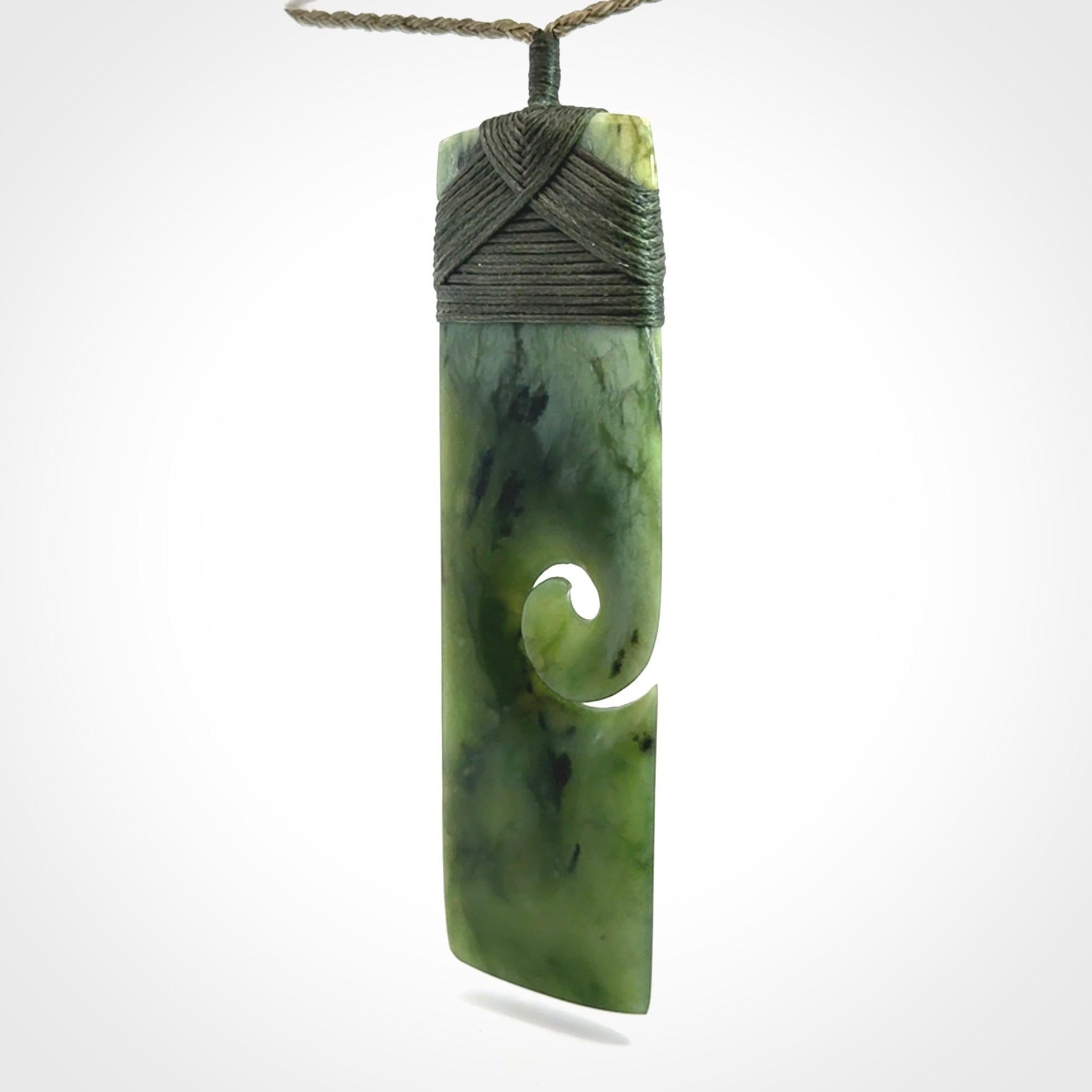 Hand carved, large, New Zealand Jade Toki with Koru pendant
