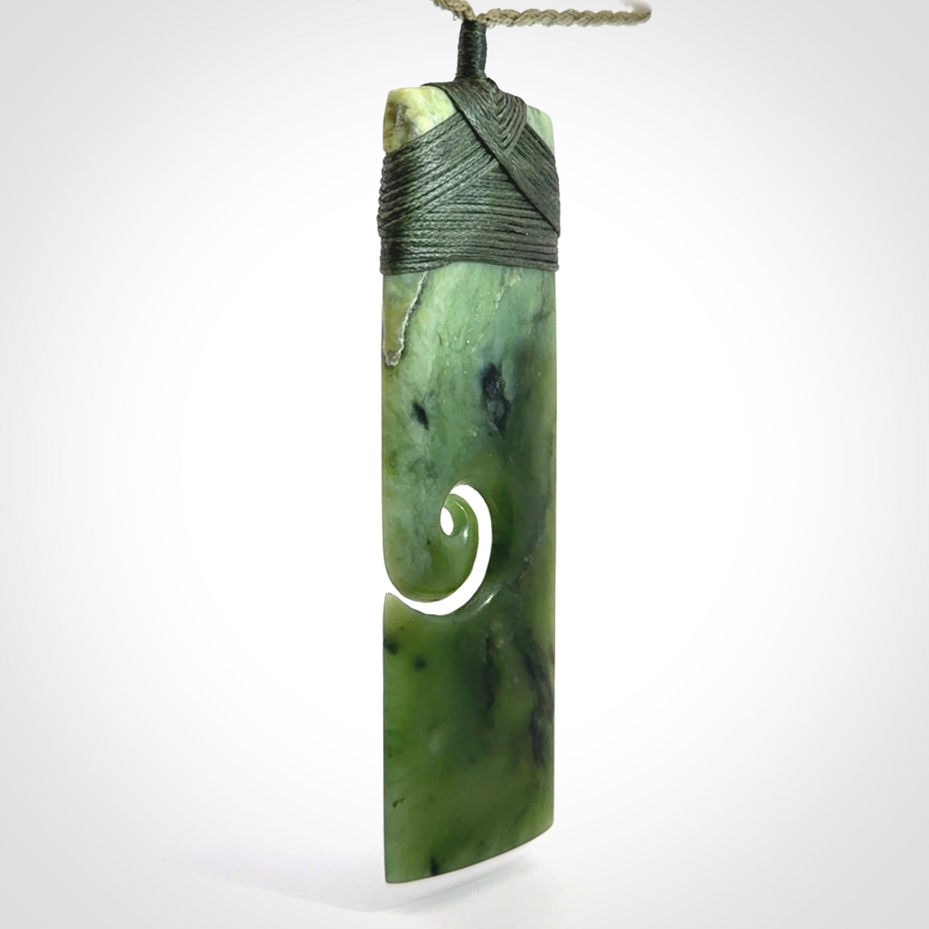 Hand carved, large, New Zealand Jade Toki with Koru pendant