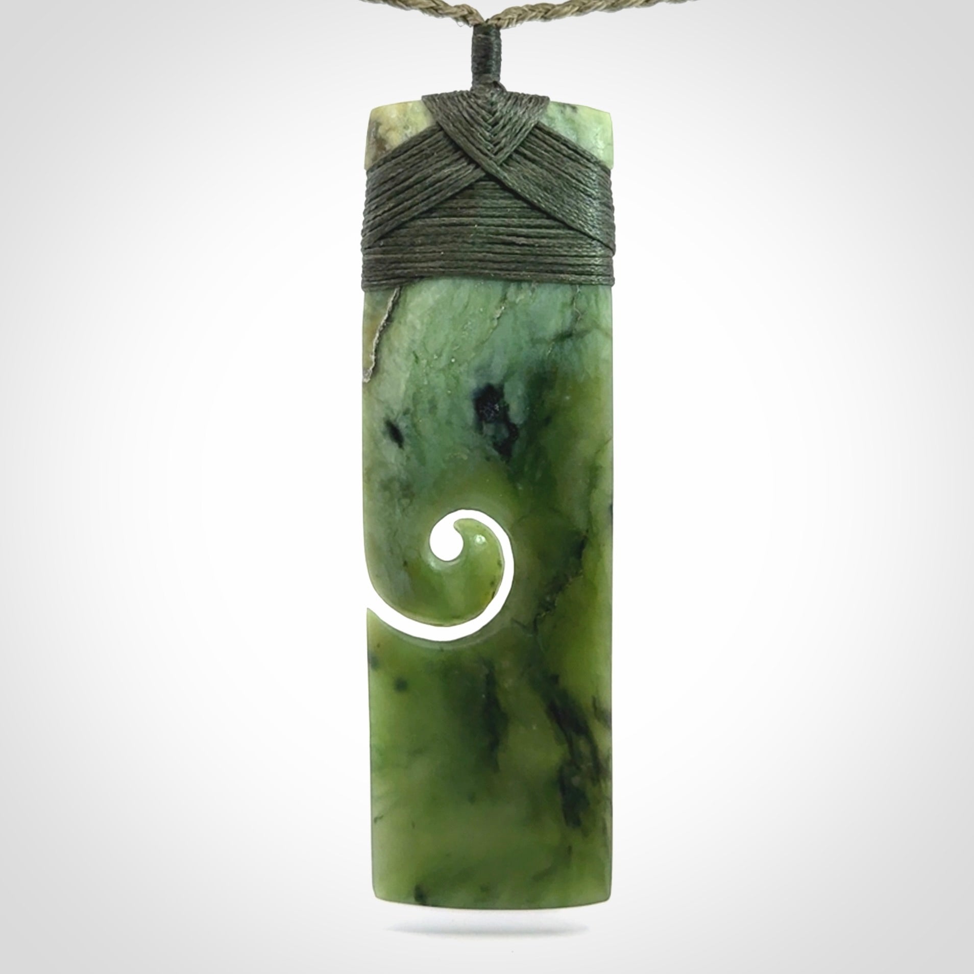 Hand carved, large, New Zealand Jade Toki with Koru pendant