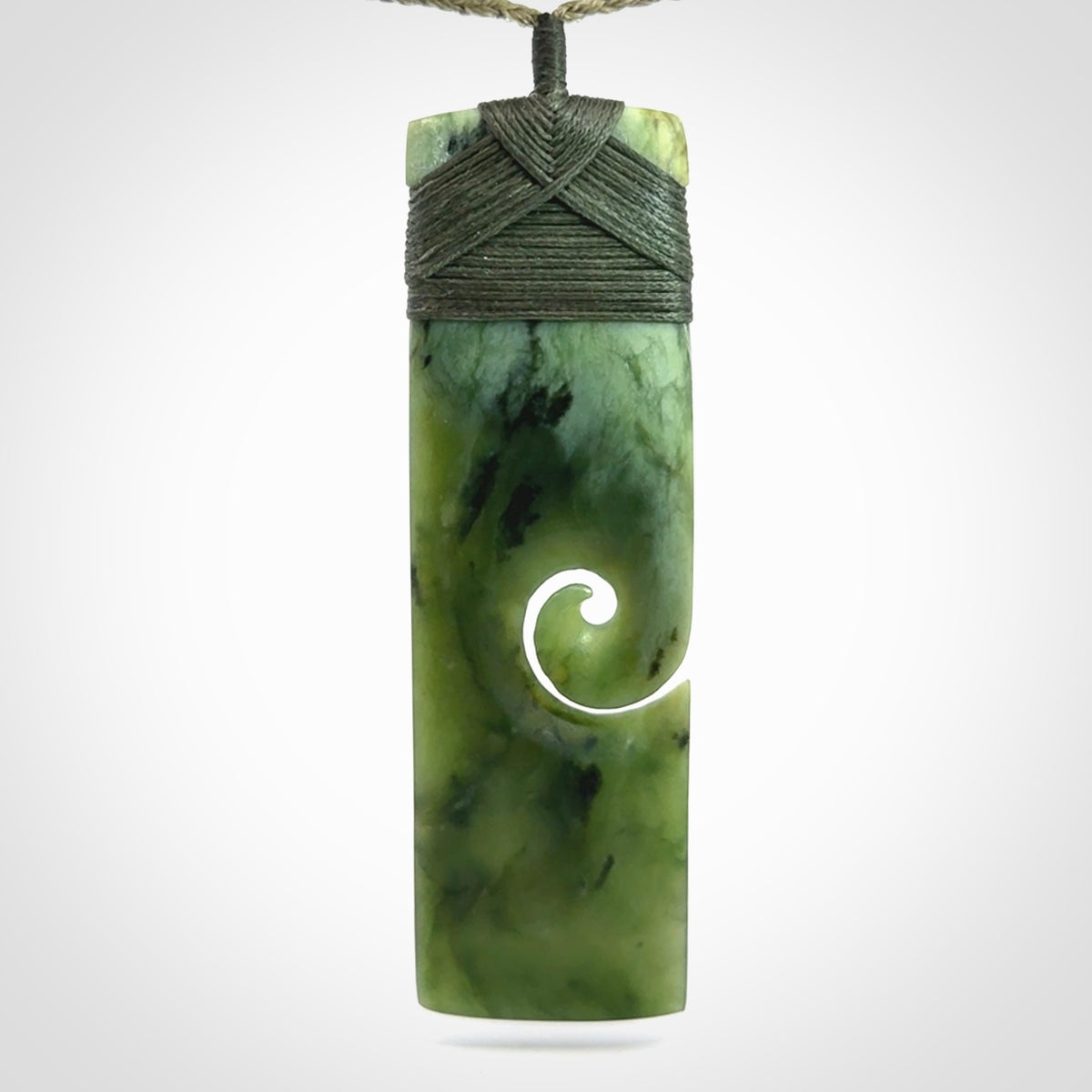 Hand carved, large, New Zealand Jade Toki with Koru pendant
