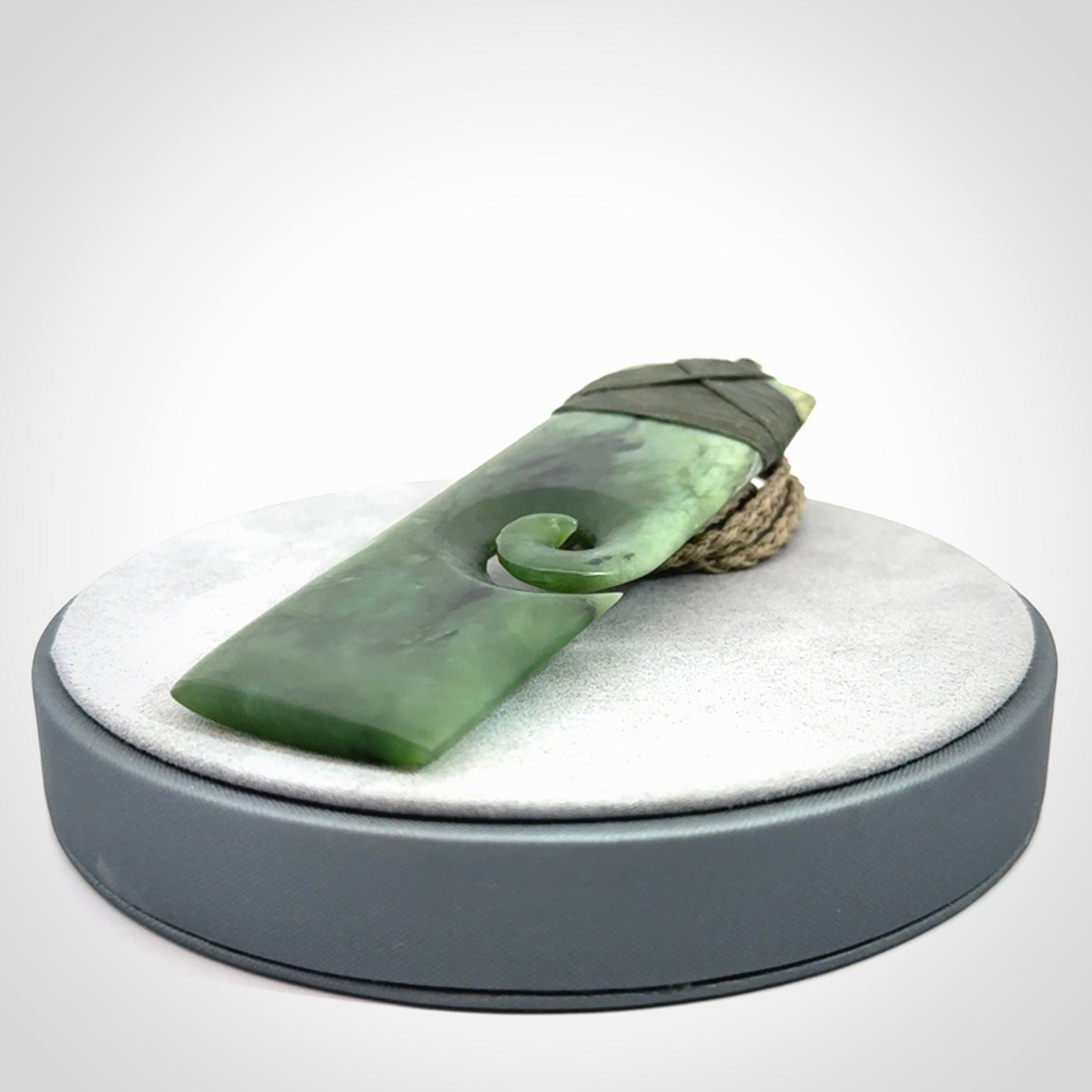 Hand carved, large, New Zealand Jade Toki with Koru pendant