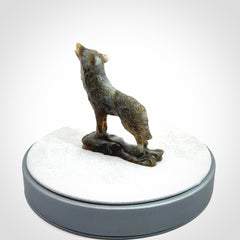 This is a hand carved wolf sculpture made from Labradorite stone.