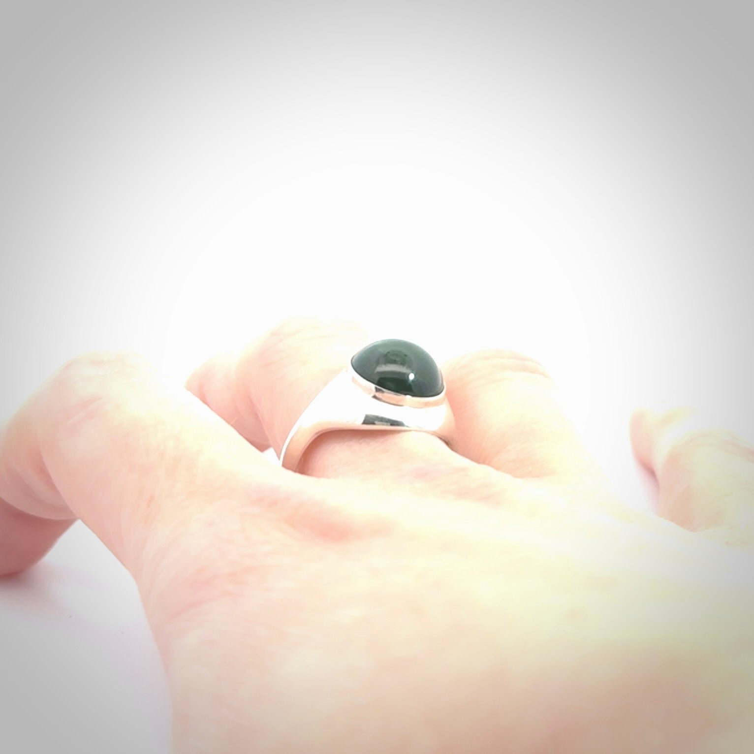 Hand carved jade signet ring with sterling silver.
