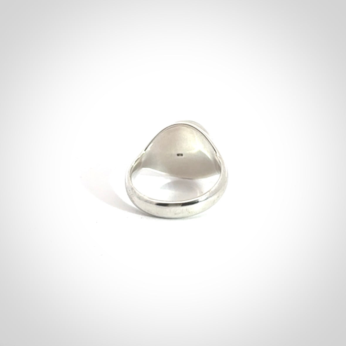 Hand carved jade signet ring with sterling silver.