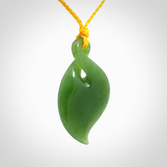 Hand carved New Zealand jade, single twist pendant with adjustable cord.