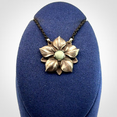 Hand crafted silver manuka flower pendant with jade insert