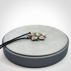 Hand crafted silver manuka flower pendant with jade insert