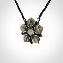 Hand crafted silver manuka flower pendant with jade insert