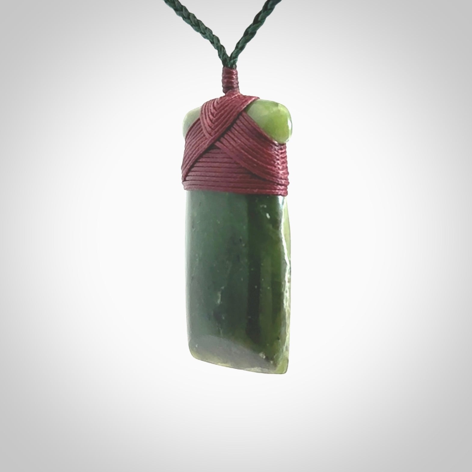 Hand carved jade toki pendant. Carved by NZ Pacific in green jade. Hand made Jade Toki necklace for men and women. Beautiful greenstone Toki with adjustable cord. Delivered to you with Express Courier.