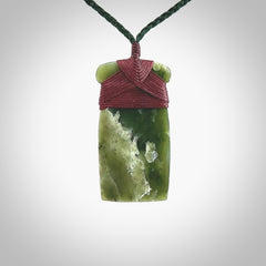 Hand carved jade toki pendant. Carved by NZ Pacific in green jade. Hand made Jade Toki necklace for men and women. Beautiful greenstone Toki with adjustable cord. Delivered to you with Express Courier.