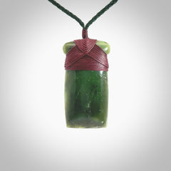 Hand carved jade toki pendant. Carved by NZ Pacific in green jade. Hand made Jade Toki necklace for men and women. Beautiful greenstone Toki with adjustable cord. Delivered to you with Express Courier.