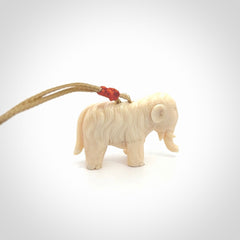 Hand carved woolly mammoth pendant. Carved from woolly mammoth tusk by NZ Pacific.