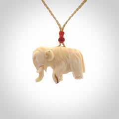 Hand carved woolly mammoth pendant. Carved from woolly mammoth tusk by NZ Pacific.
