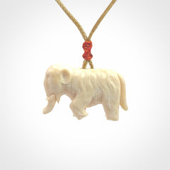 Hand carved woolly mammoth pendant. Carved from woolly mammoth tusk by NZ Pacific.
