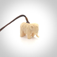 Hand carved woolly mammoth pendant. Carved from woolly mammoth tusk by NZ Pacific.