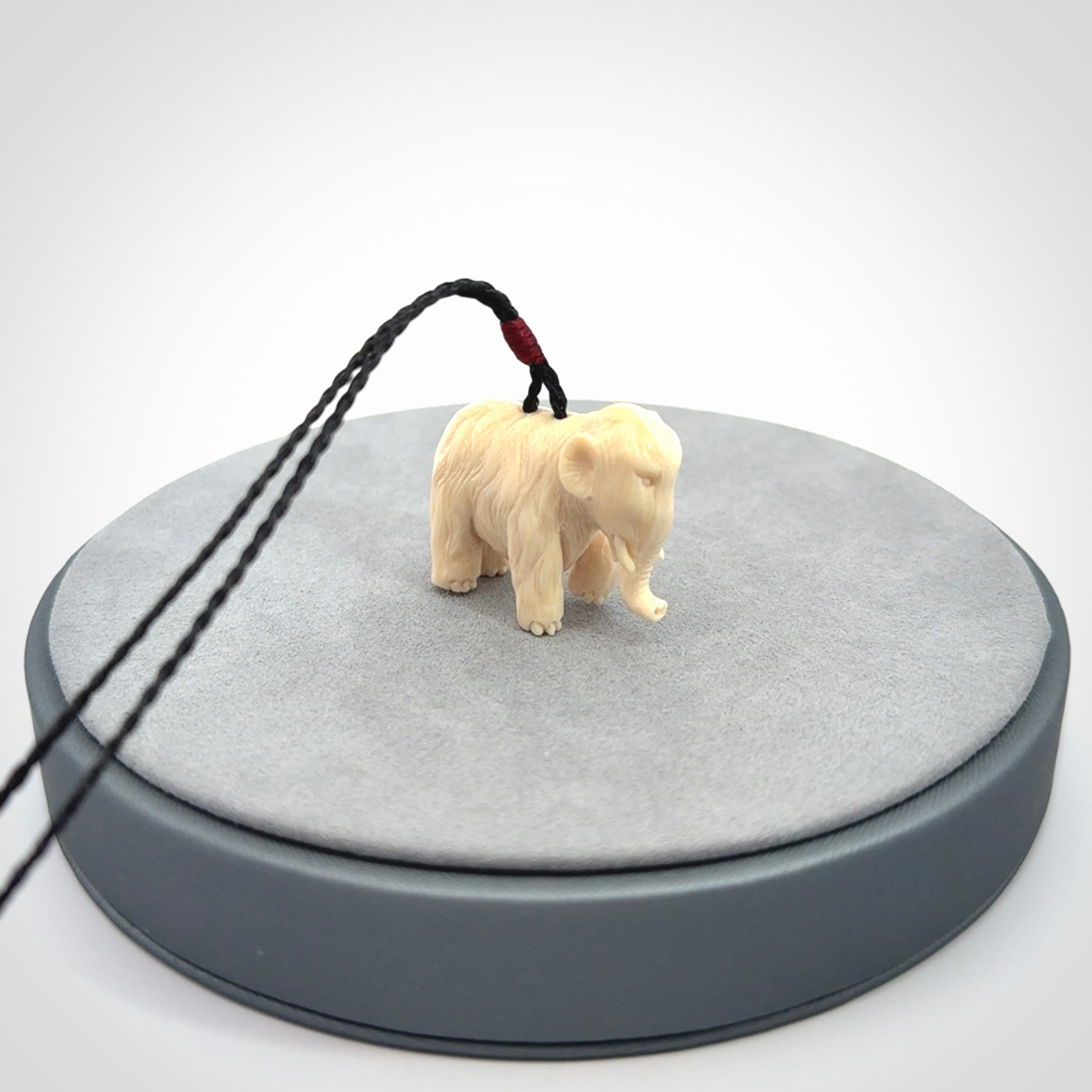 Woolly Mammoth Pendants... Hand Carved in Woolly Mammoth Tusk!