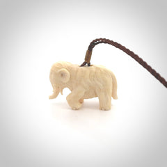 Hand carved woolly mammoth pendant. Carved from woolly mammoth tusk by NZ Pacific.