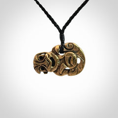 Bronze Tiki pendants