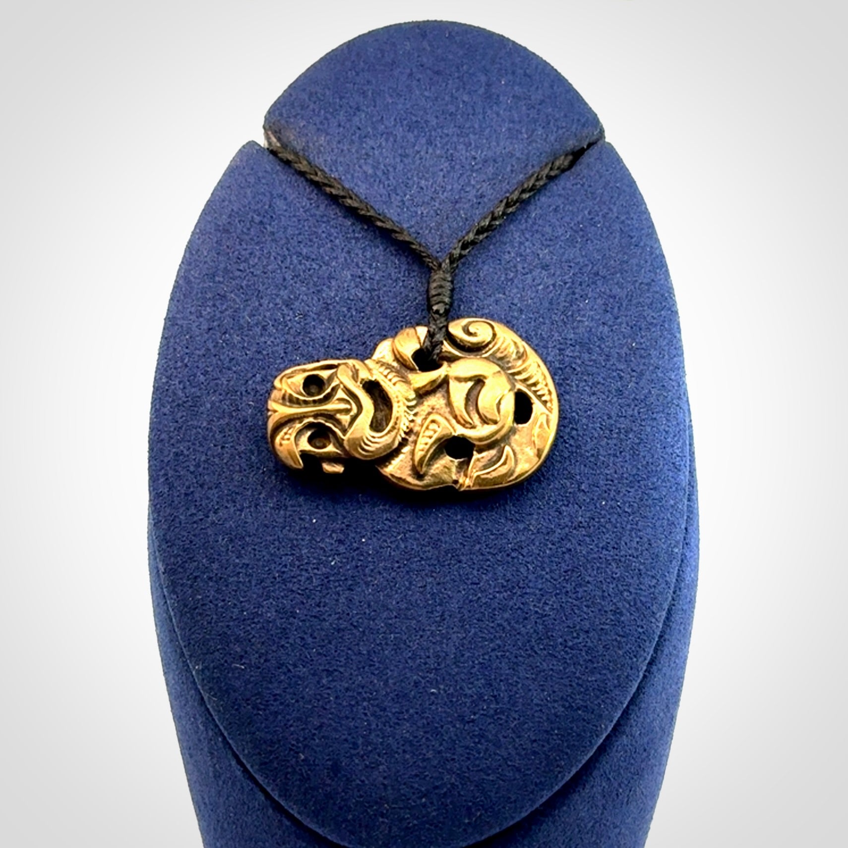 Bronze Tiki pendants