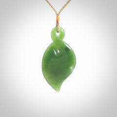 Hand carved New Zealand jade, single twist pendant. Jade twist pendant hand carved in New Zealand. Made by NZ Pacific, jade jewellery for sale online. One only hand made by Ross Crump.