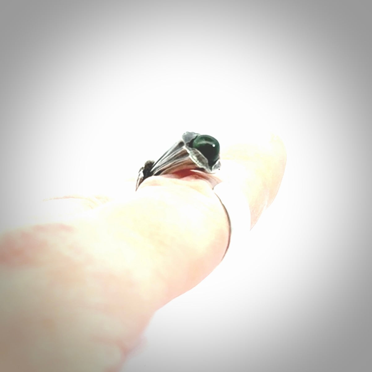 Hand carved jade flower bud open ring with sterling silver.