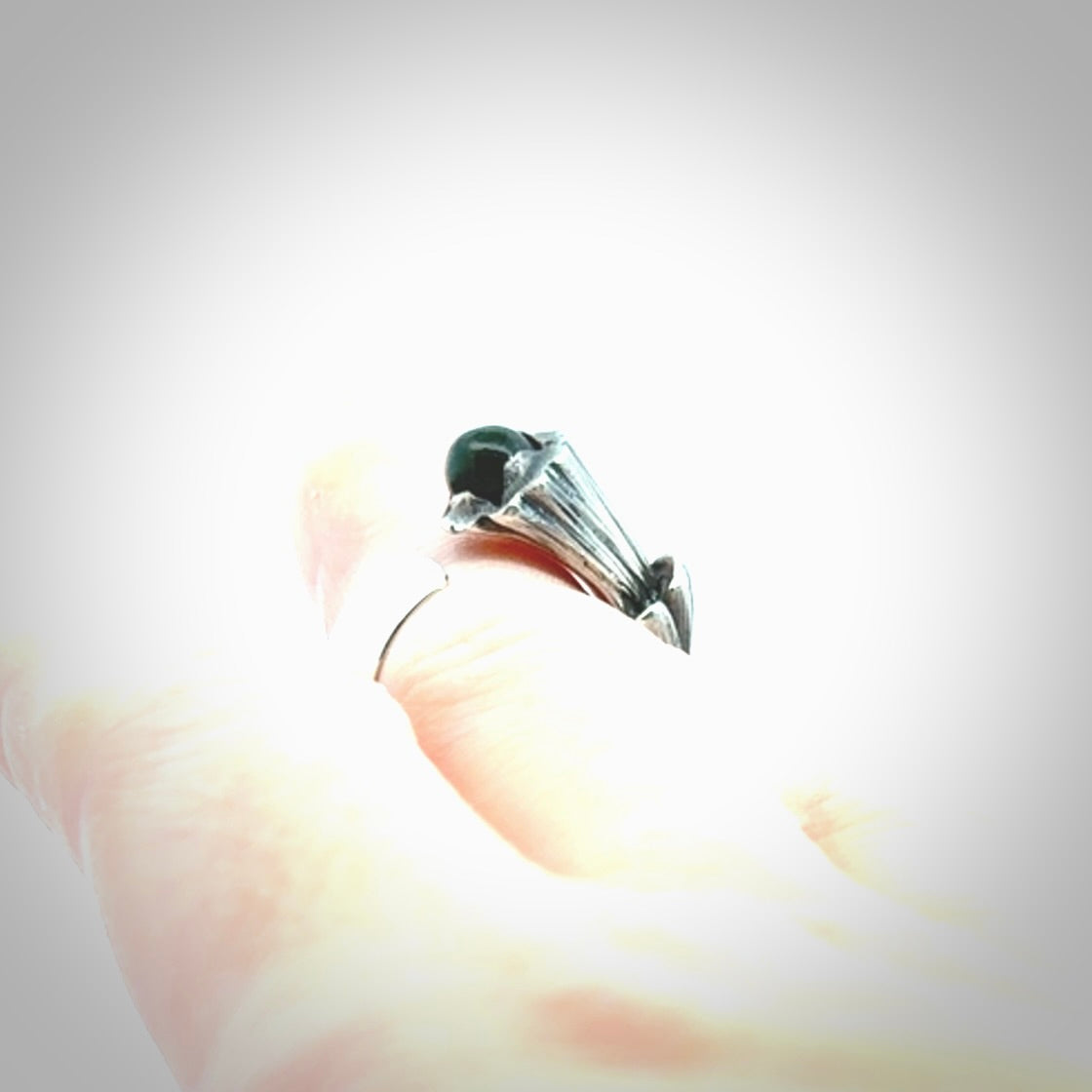 Hand carved jade flower bud open ring with sterling silver.