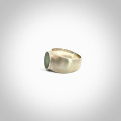 Hand carved jade band ring with sterling silver.