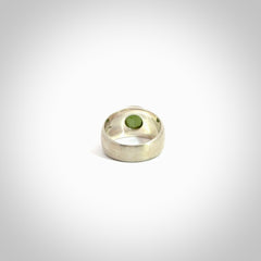 Hand carved jade band ring with sterling silver.