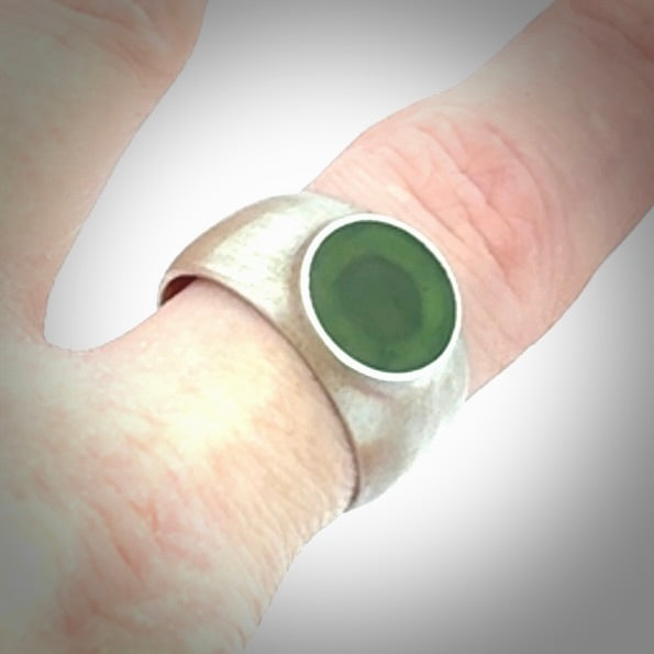 Hand carved jade band ring with sterling silver.