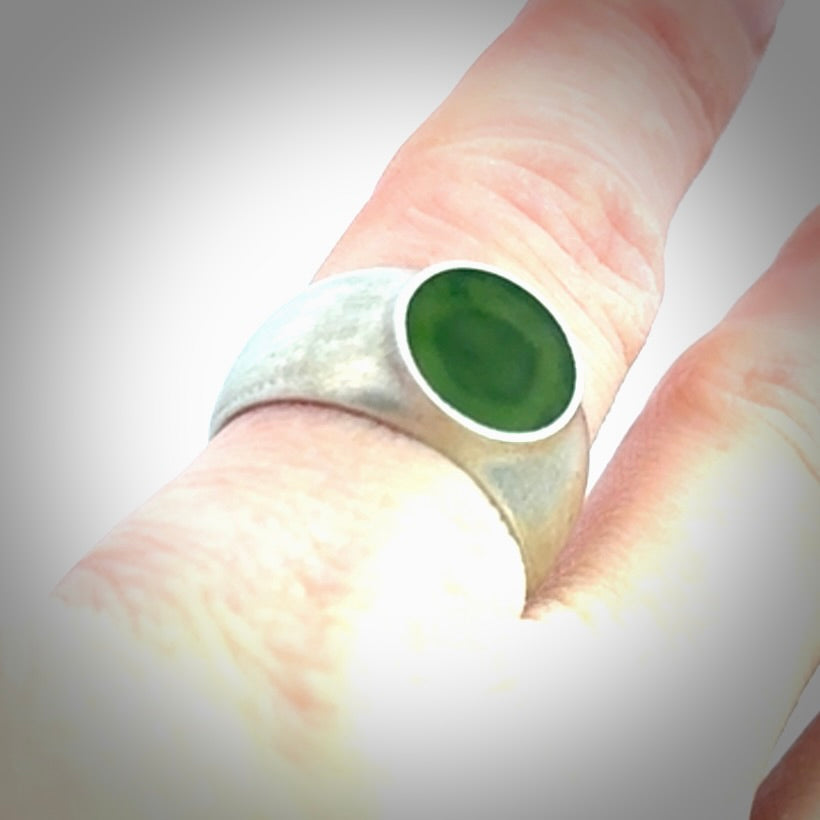 Hand carved jade band ring with sterling silver.