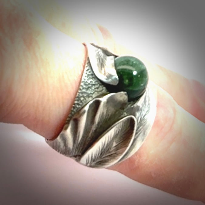 Hand carved jade band ring with sterling silver.