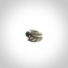 Hand carved jade band ring with sterling silver.