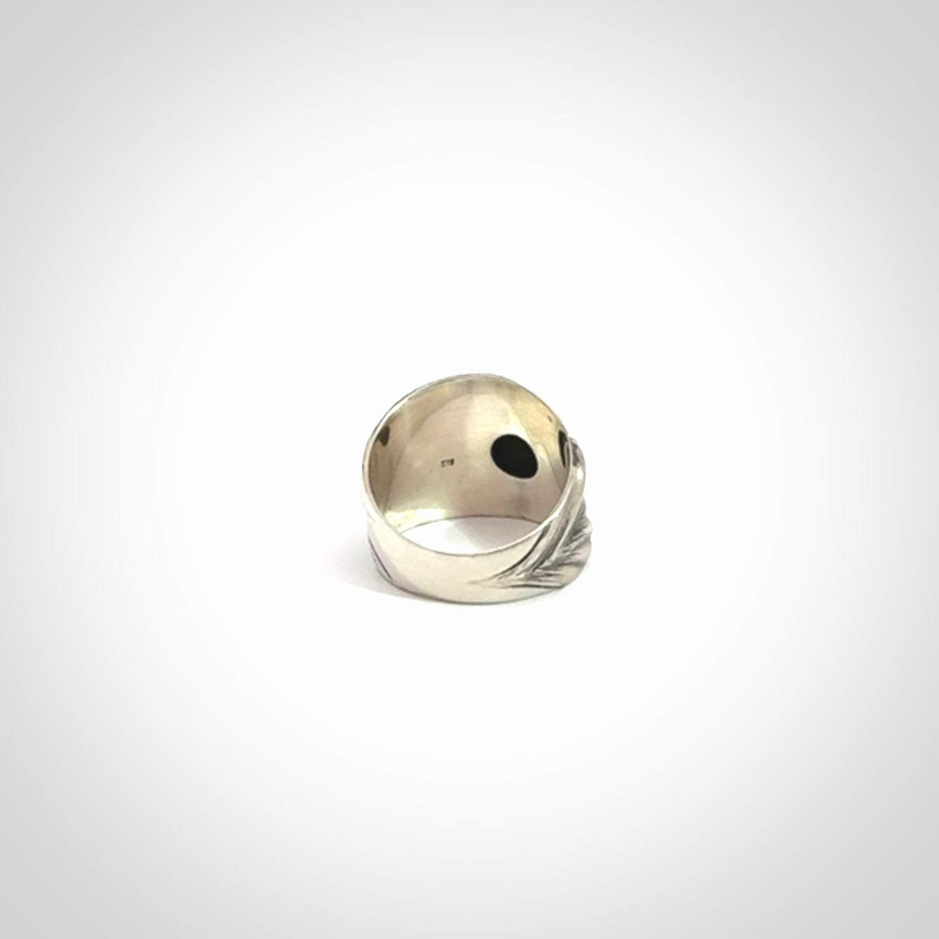 Hand carved jade band ring with sterling silver.