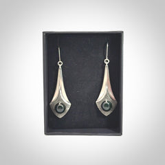 These are hand carved Sterling Silver lantern earrings with New Zealand Jade insert.