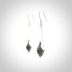 These are hand carved Sterling Silver lantern earrings with New Zealand Jade insert.