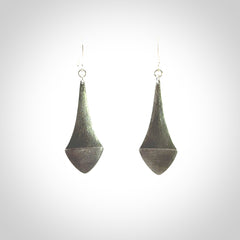 These are hand carved Sterling Silver lantern earrings with New Zealand Jade insert.