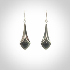 These are hand carved Sterling Silver lantern earrings with New Zealand Jade insert.